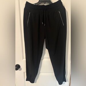 ATHLETA JOGGERS - Womens 

No rips or tears. Both zippers work on pockets